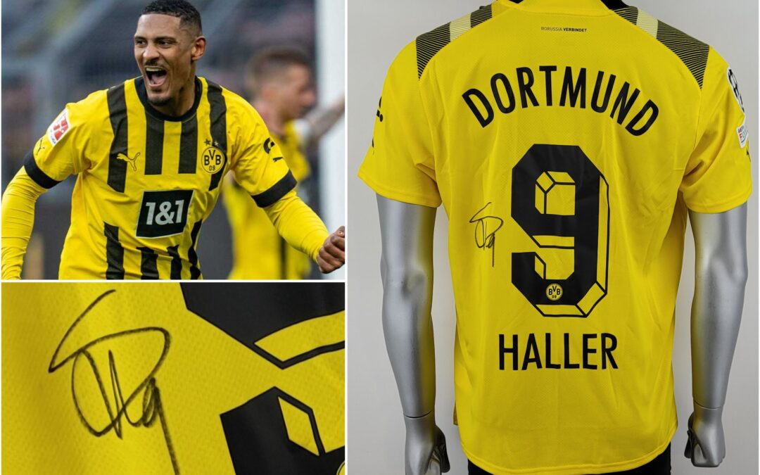 Haller signiert Trikot zum Weltkinderkrebstag